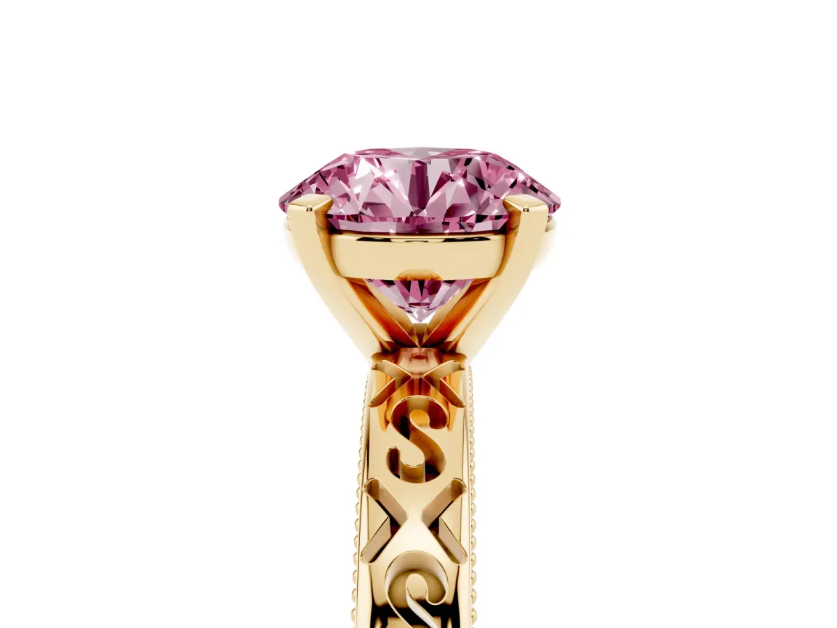 Fancy Pink Round Cut Solitaire Engagement Ring with Scrollwork Band and Four-Prong Setting Yellow gold