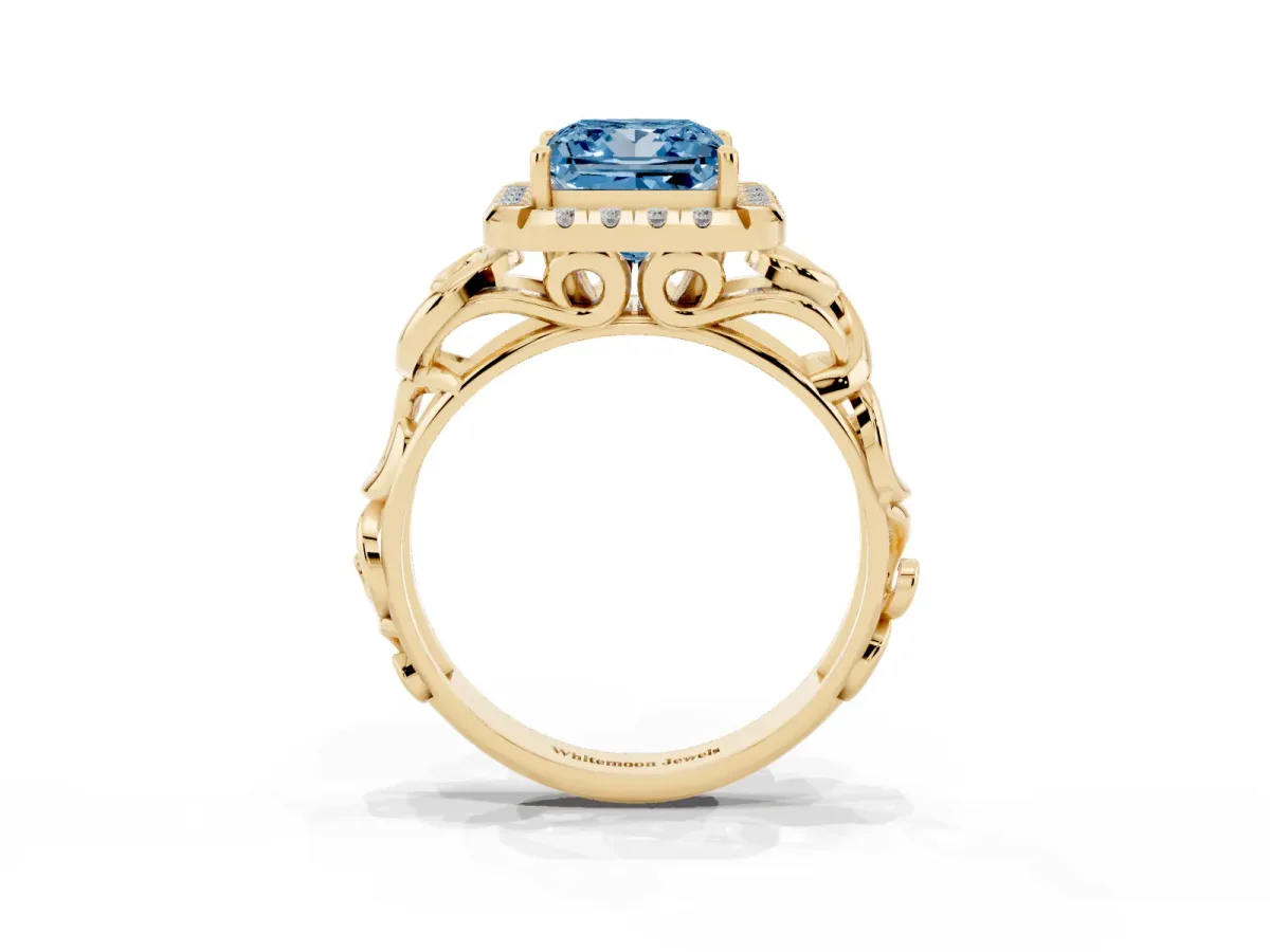 Fancy Blue Princess Cut Cut Halo Diamond Ring with Scrollwork Band and Four-Prong Setting Yellow gold