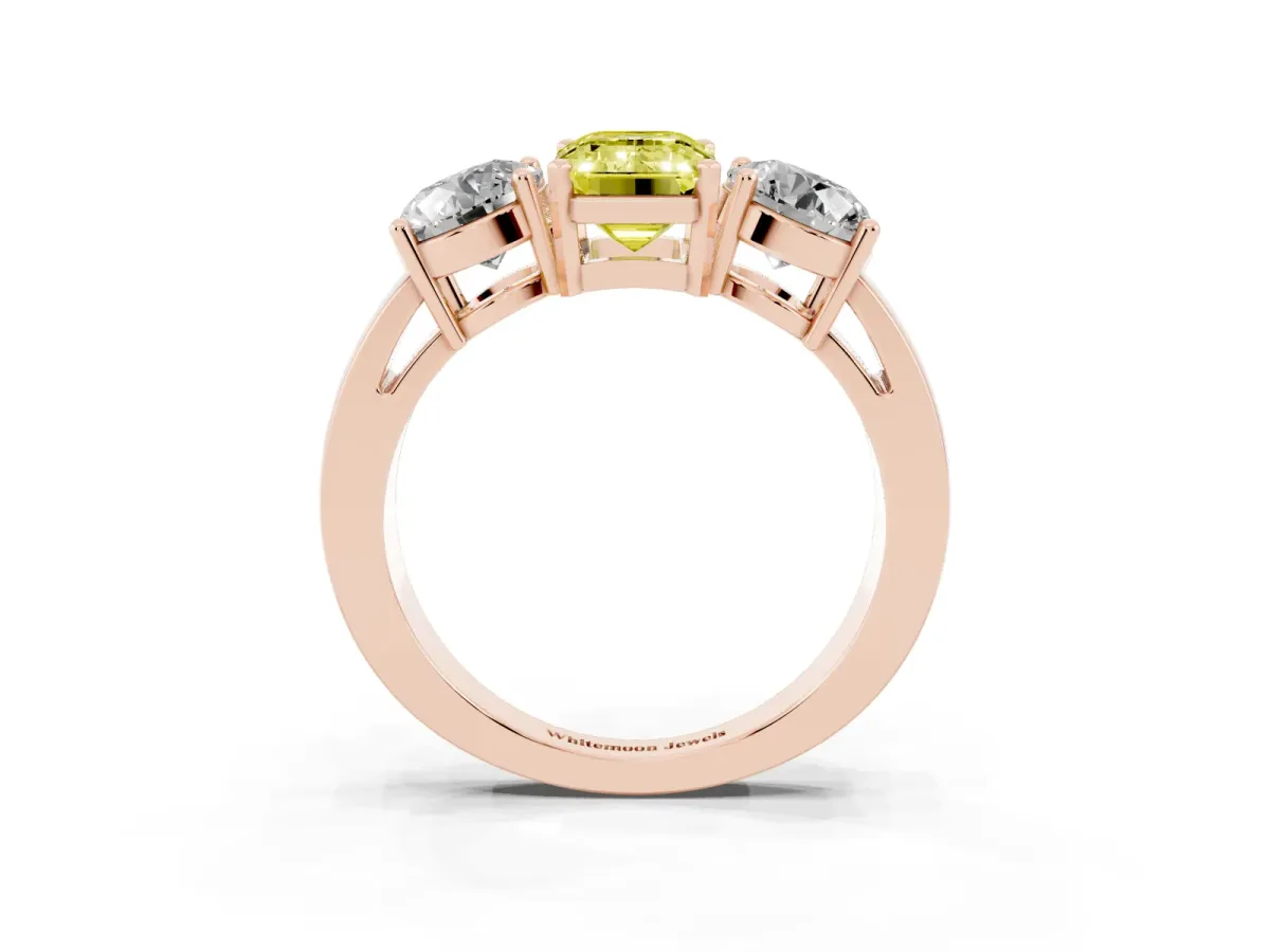 Fancy Yellow Three-Stone Emerald Cut Diamond Ring with Round Side Stones, Classic Band, and Four-Prong Setting Rose gold