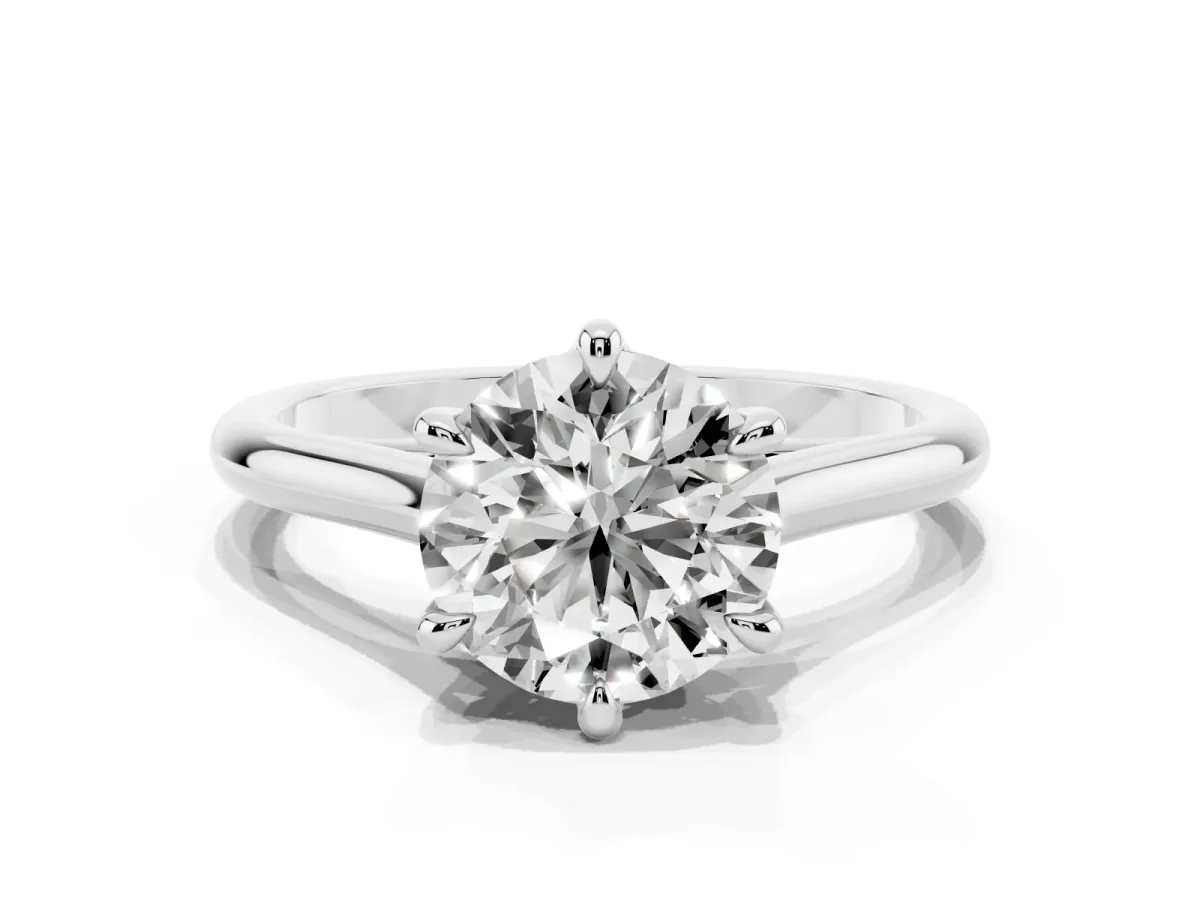 Round Cut Solitaire Engagement Ring with Six-Prong Setting and Classic Band Silver