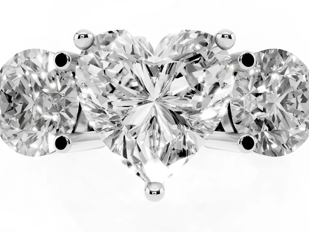Three-Stone Heart Cut Brilliant Cut Solitaire Ring with Prong Setting on a Classic Band Silver