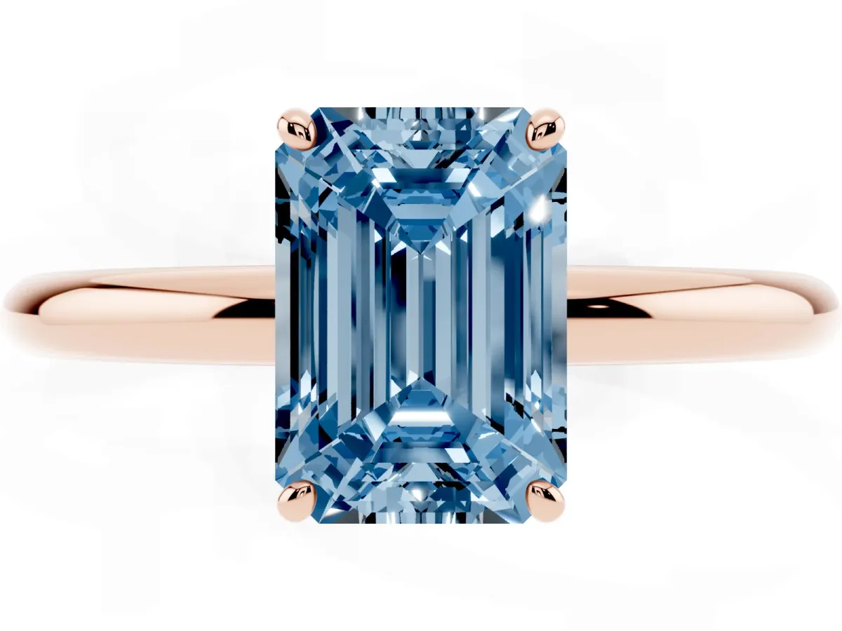 Fancy Blue Emerald Cut Solitaire Diamond Ring with Four-Prong Setting on a Plain Band Rose gold
