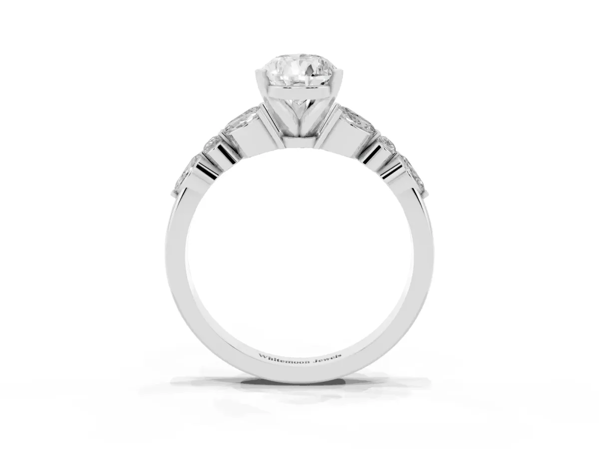 Pear Cut Diamond Solitaire Ring with Side Stones and Four-Prong Setting Silver