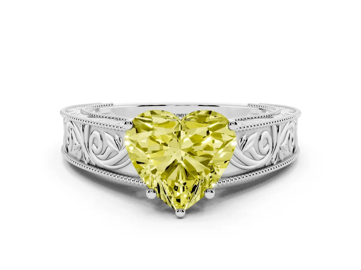 Fancy Yellow Heart Cut Diamond Solitaire Ring with Engraved Band and Four-Prong Setting White gold