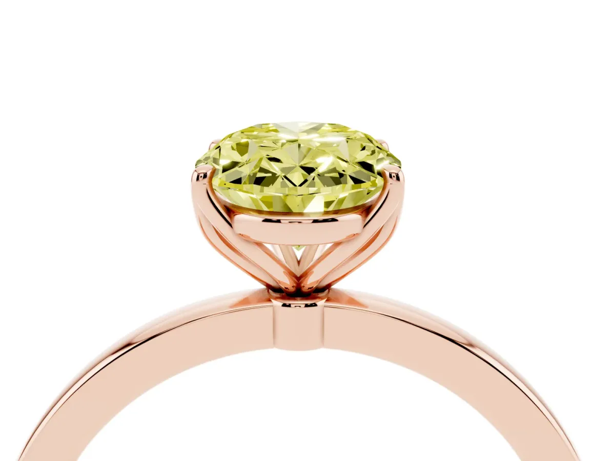 Fancy Yellow Oval Cut Diamond Solitaire Ring with Thin Band and Prong Setting Rose gold