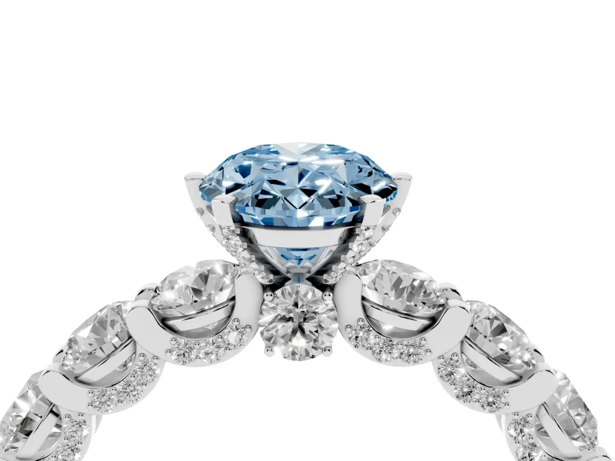 Fancy Blue Oval Cut Diamond Side Stone Engagement Ring with Four-Prong Setting Platinum