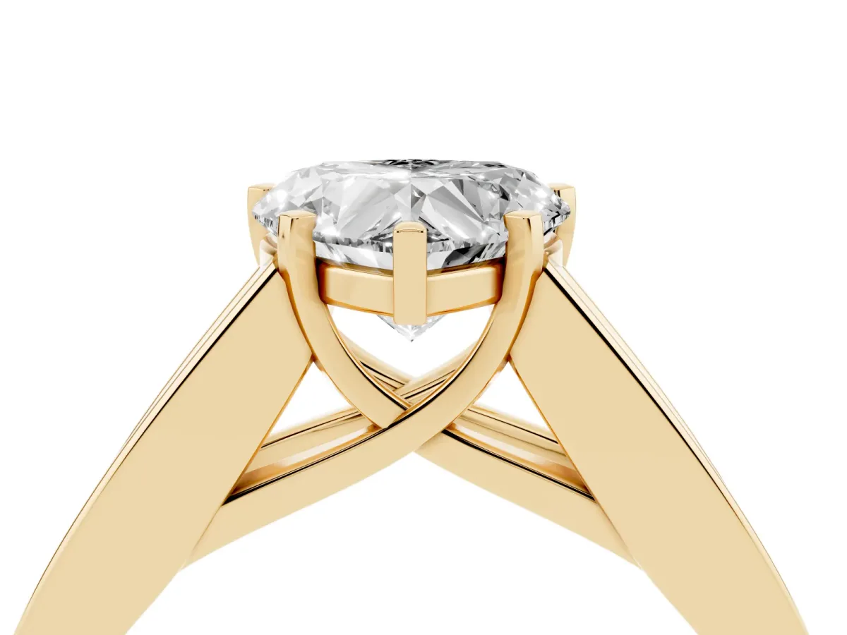 Heart Cut Cut Channel Set Solitaire Ring with Four-Prong Setting Yellow gold
