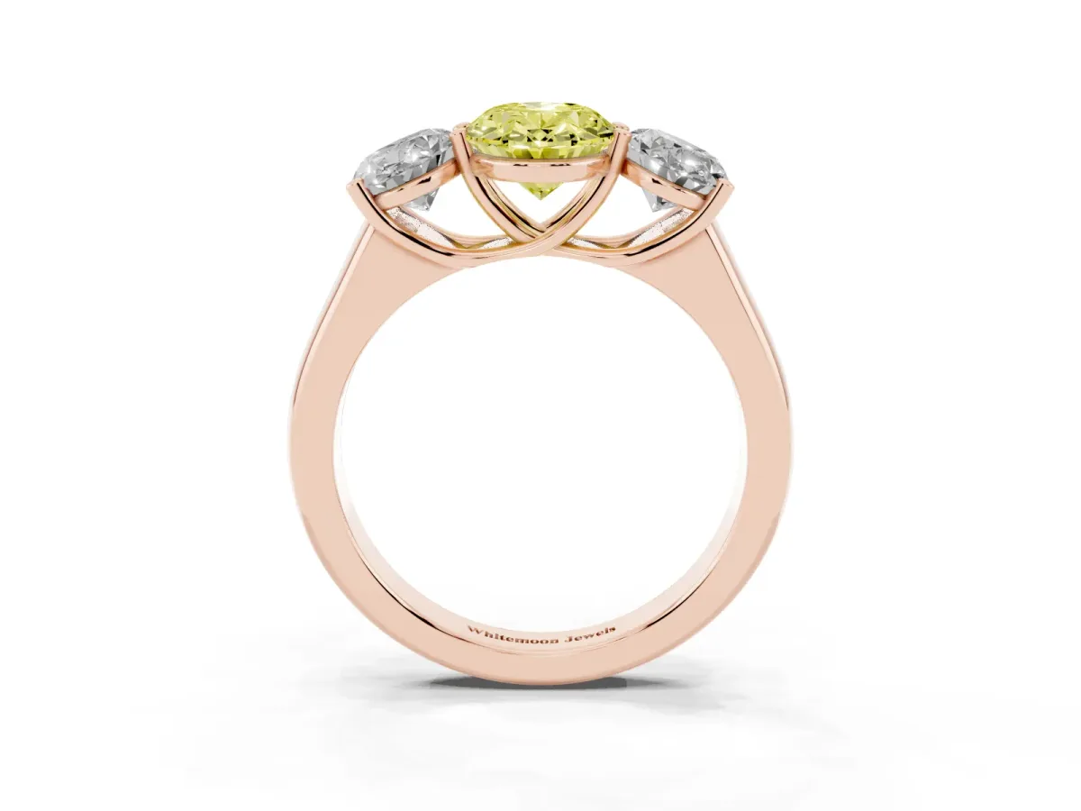 Fancy Yellow Oval Cut Three-Stone Diamond Ring with Prong Setting on a Classic Band Rose gold