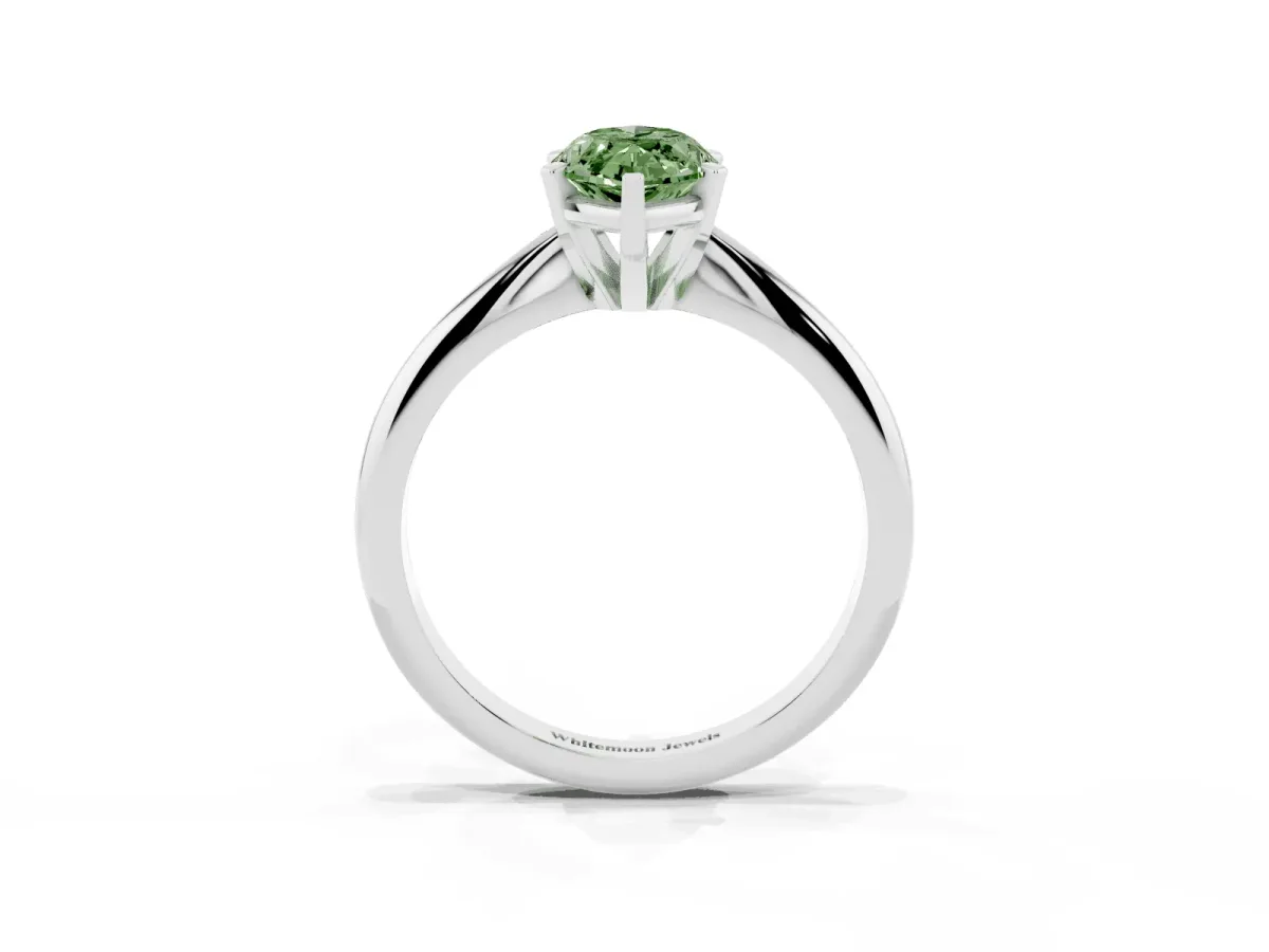 Fancy Green Marquise Cut Cut Solitaire Ring with Four-Prong Setting on a Classic Band Silver