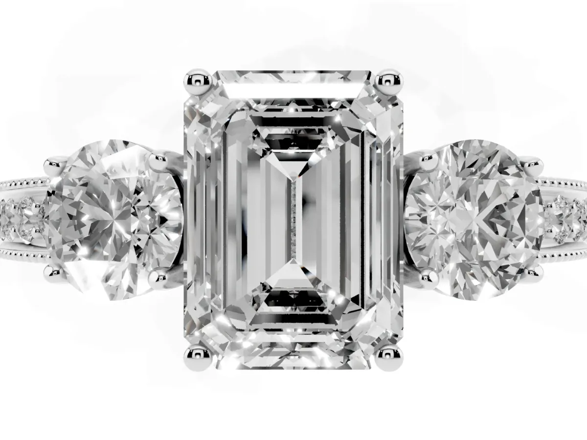 Emerald Cut Three-Stone Diamond Ring with Pavé Band and Four-Prong Setting Silver