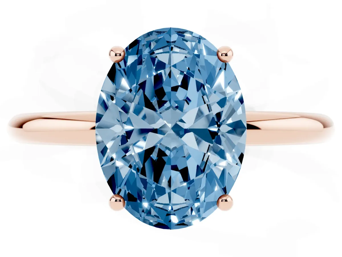 Fancy Blue Oval Cut Solitaire Diamond Ring with a Classic Band and Four-Prong Setting Rose gold