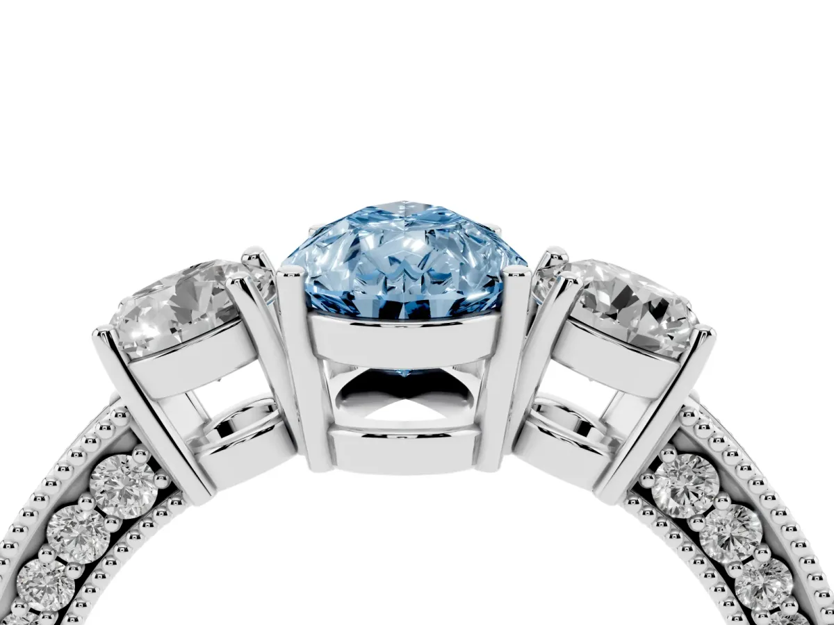Fancy Blue Pear Cut Three-Stone Diamond Ring with Pavé Band and Four-Prong Setting Silver