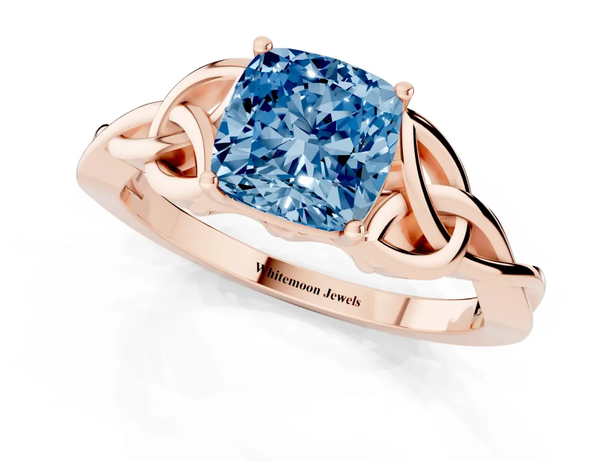 Fancy Blue Cushion Cut Diamond Solitaire Engagement Ring with Celtic Knot Band and Four-Prong Setting Rose gold