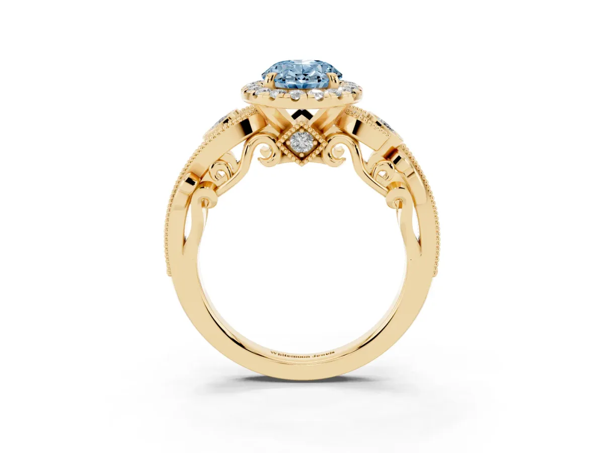 Fancy Blue Oval Cut Halo Diamond Ring with Milgrain and Bezel Accents on a Split Shank Band Yellow gold