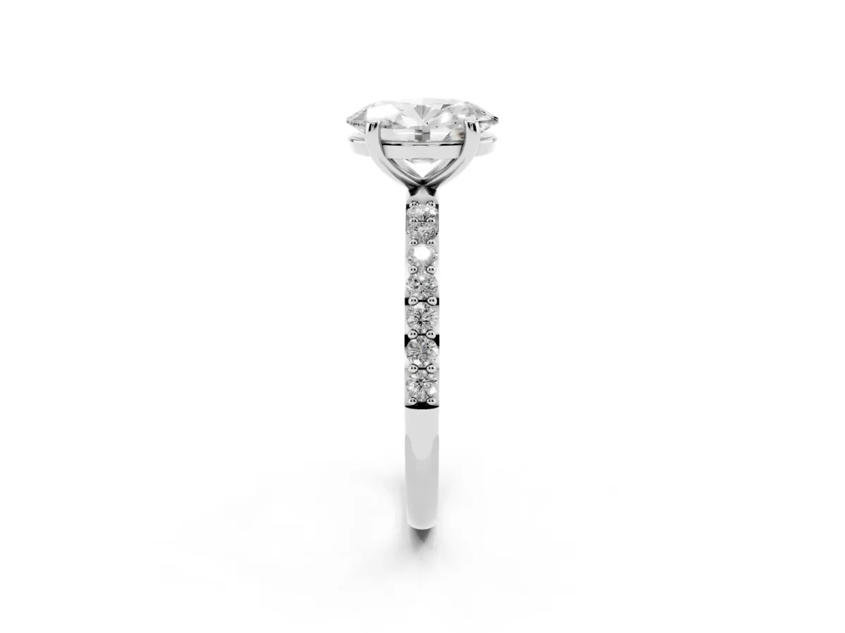 Oval Cut Diamond Solitaire Ring with Round Pavé Band and Prong Setting Silver