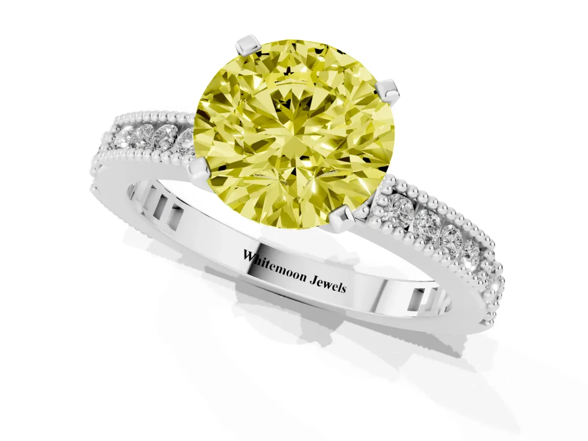 Fancy Yellow Round Cut Solitaire with Pavé Band and Four-Prong Setting Platinum