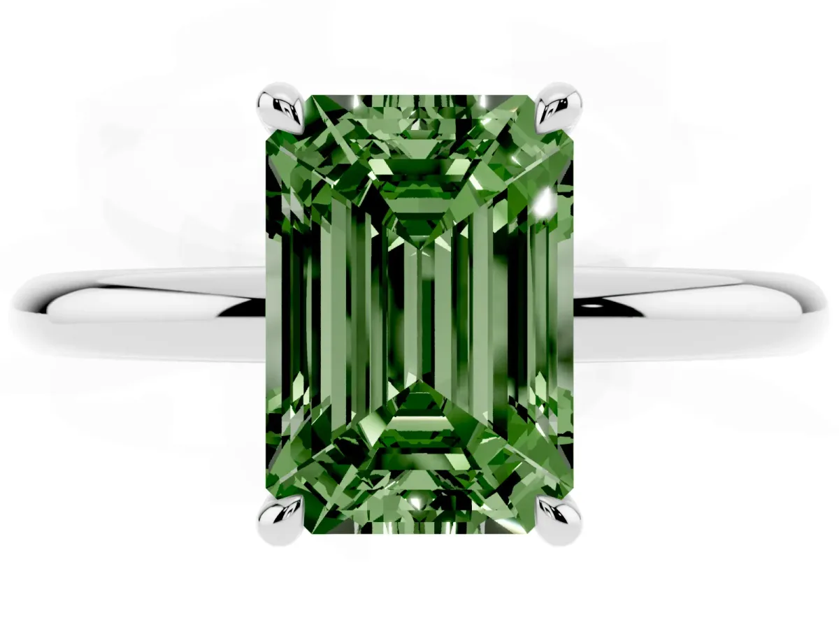 Fancy Green Emerald Cut Diamond Solitaire Ring with Thin Band and Four-Prong Setting Silver