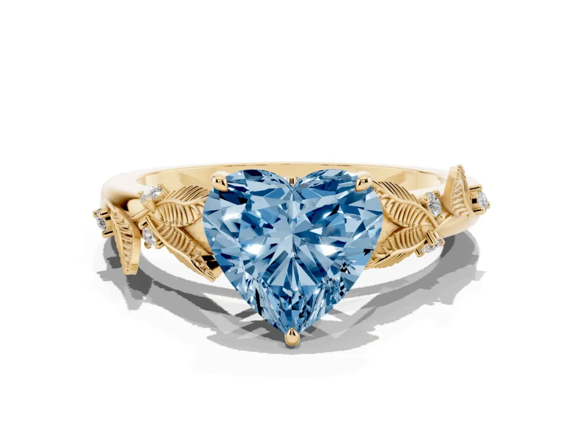 Fancy Blue Heart Cut Diamond Solitaire Ring with Leaf Motif Band and Four-Prong Setting Yellow gold