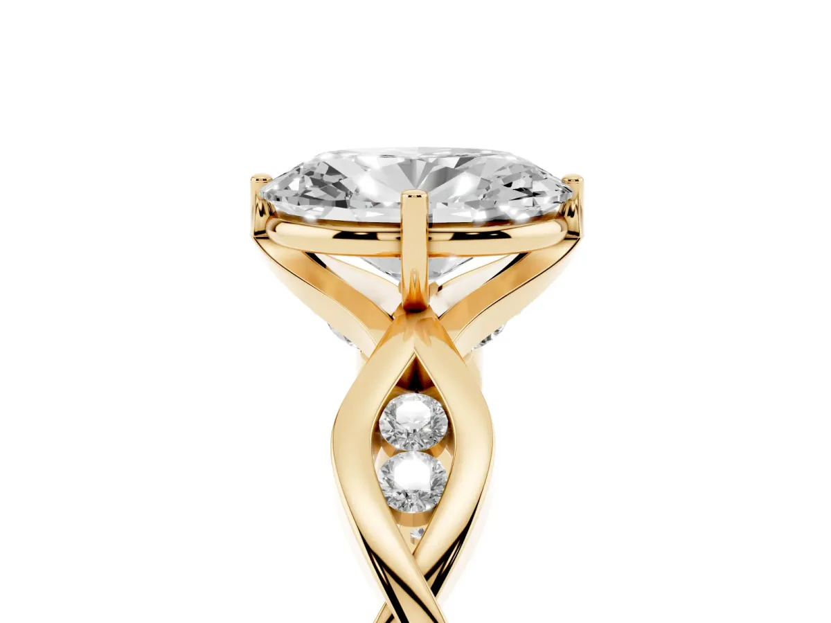 Oval Cut Solitaire Twist Band with Leaf Prong Setting Yellow gold