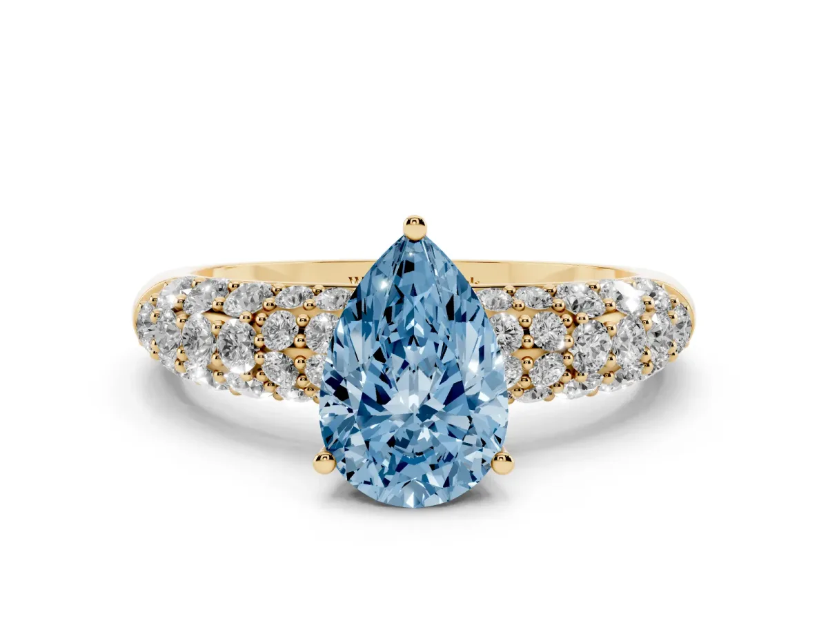 Fancy Blue Pear Cut Diamond Pavé Band Solitaire Ring with Four-Prong Setting Yellow gold