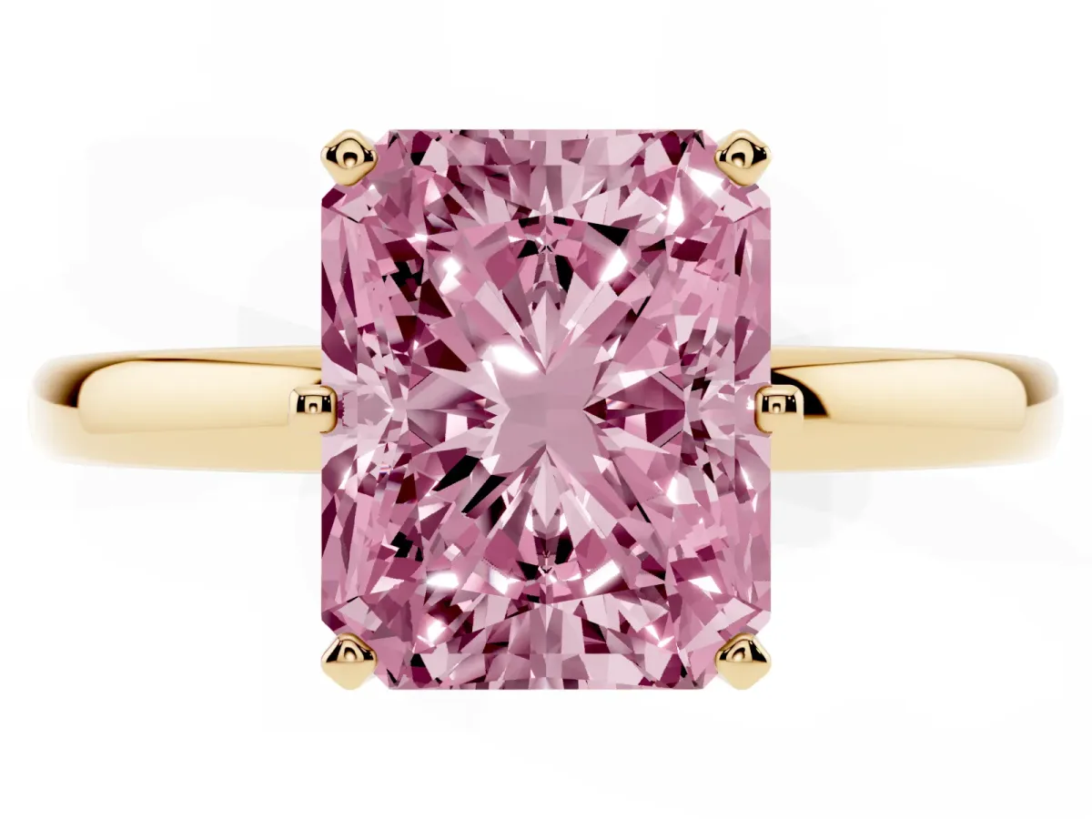 Fancy Pink Radiant Cut Solitaire Diamond Ring with Six-Prong Setting on a Classic Band Yellow gold