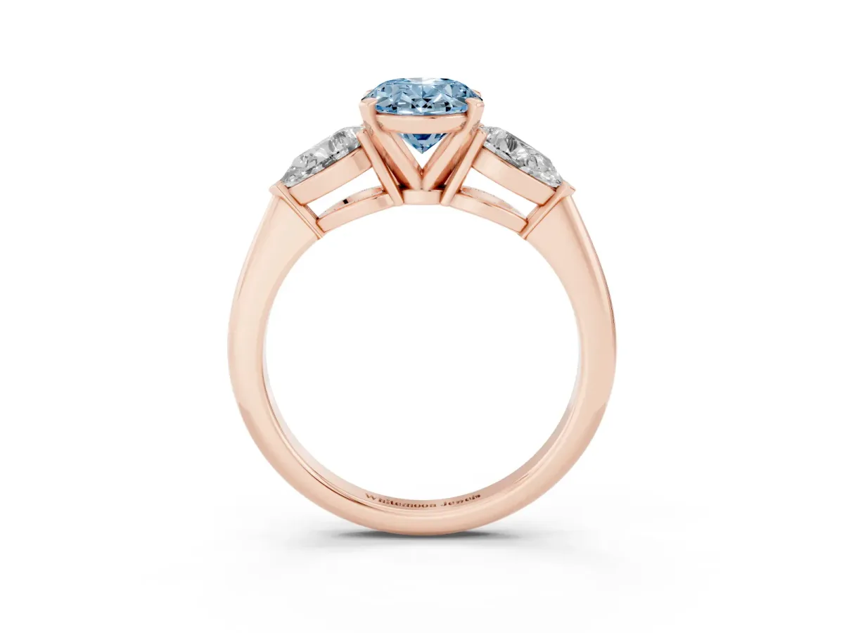Fancy Blue Three-Stone Oval Cut Diamond Ring with Pear Side Stones and Four-Prong Setting Rose gold