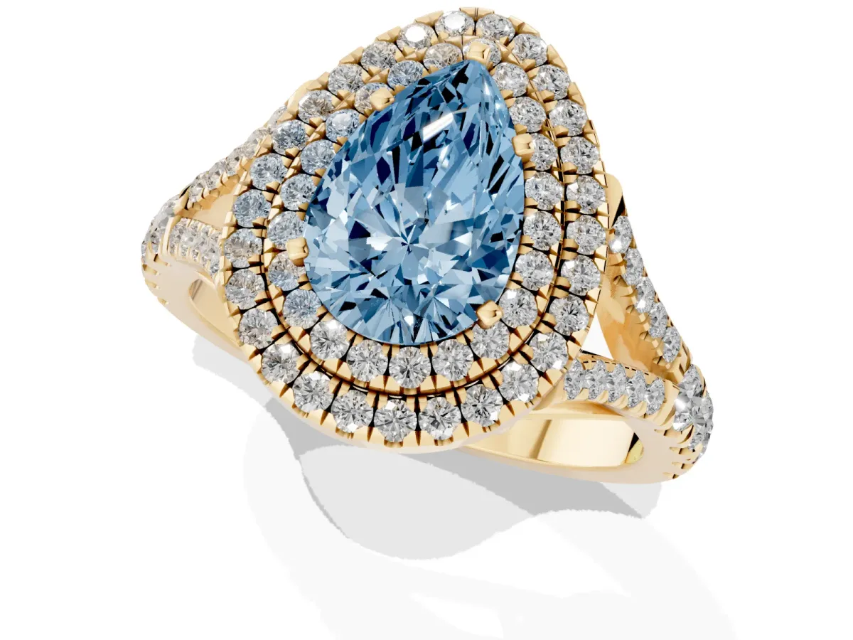 Fancy Blue Double Halo Pear Cut Diamond Split Shank Engagement Ring with Four-Prong Setting Yellow gold