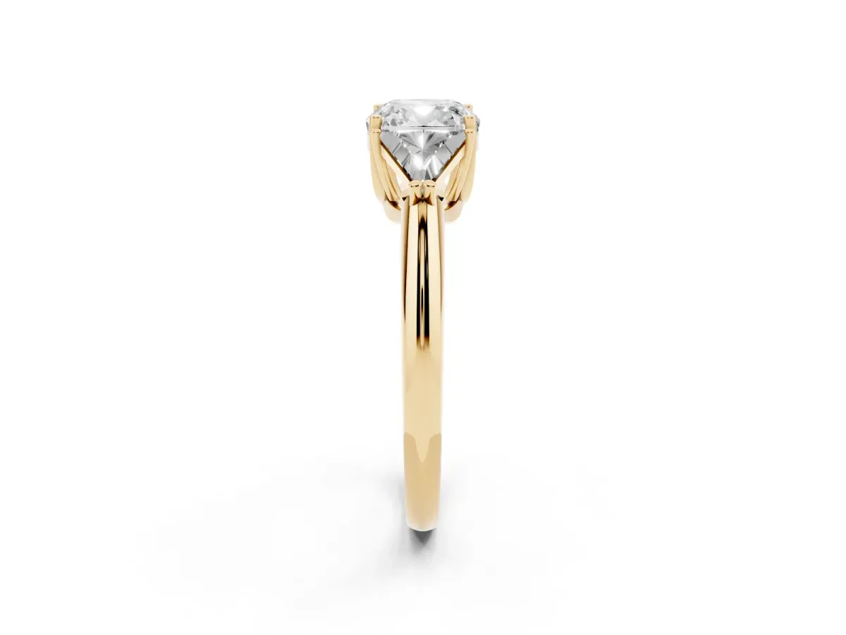 Three-Stone Cushion Cut Diamond Engagement Ring with Trillion Side Stones and Prong Setting Yellow gold