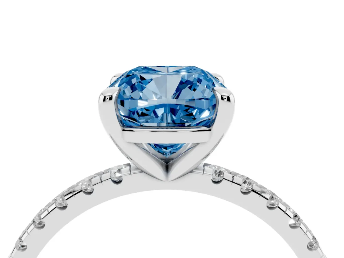 Fancy Blue Cushion Cut Diamond Brilliant Solitaire Ring with Pavé Band and Four-Prong Setting Silver