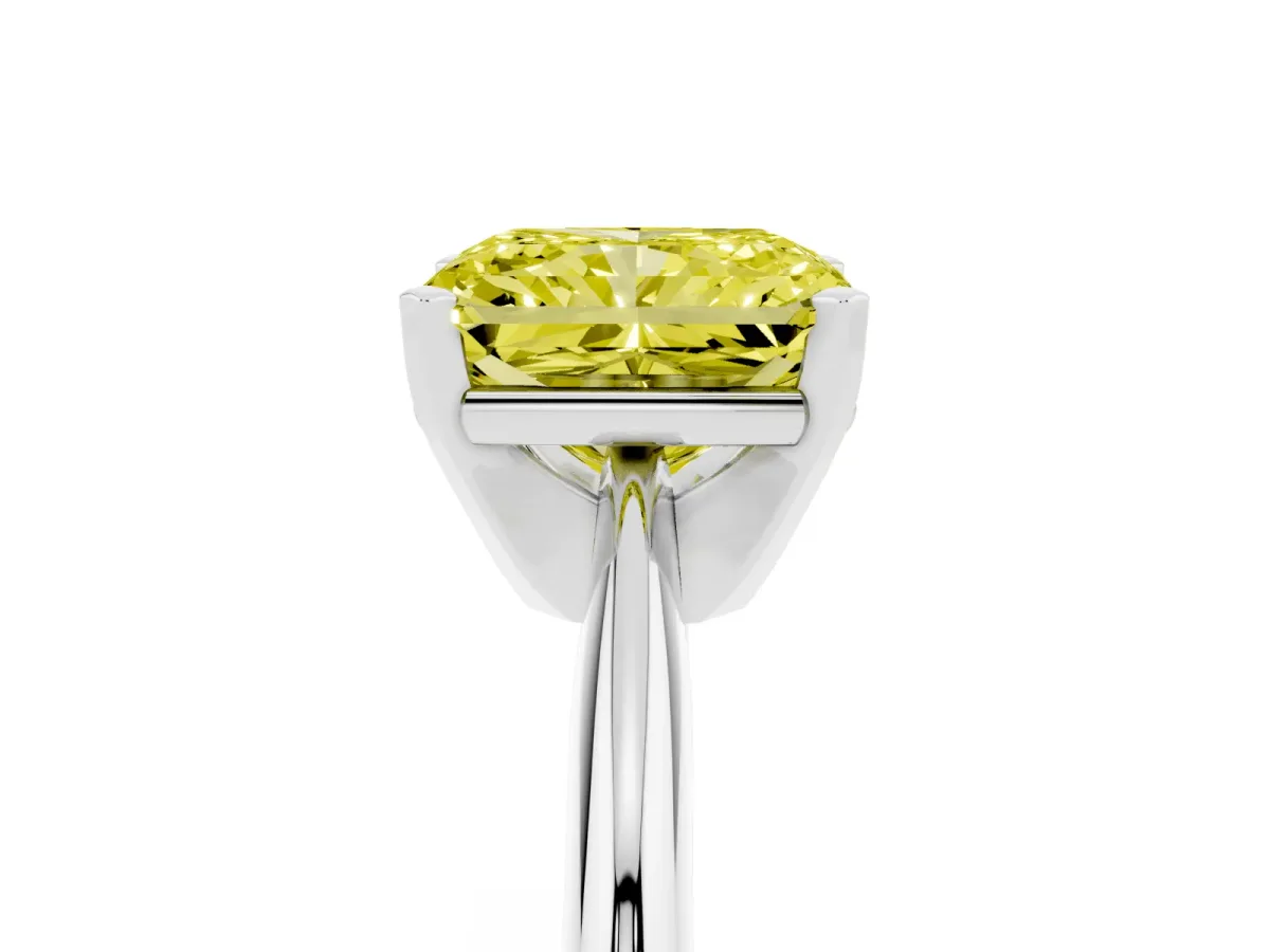 Fancy Yellow Radiant Cut Cut Solitaire Ring with Four-Prong Setting on a Classic Band Silver