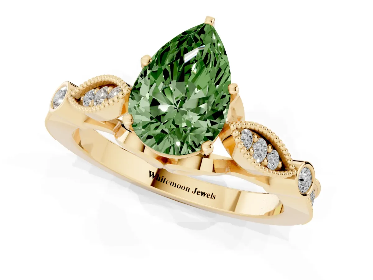 Fancy Green Pear Cut Cut Diamond with Milgrain Marquise and Bezel Accents on a Solitaire Band with Prong Setting Yellow gold