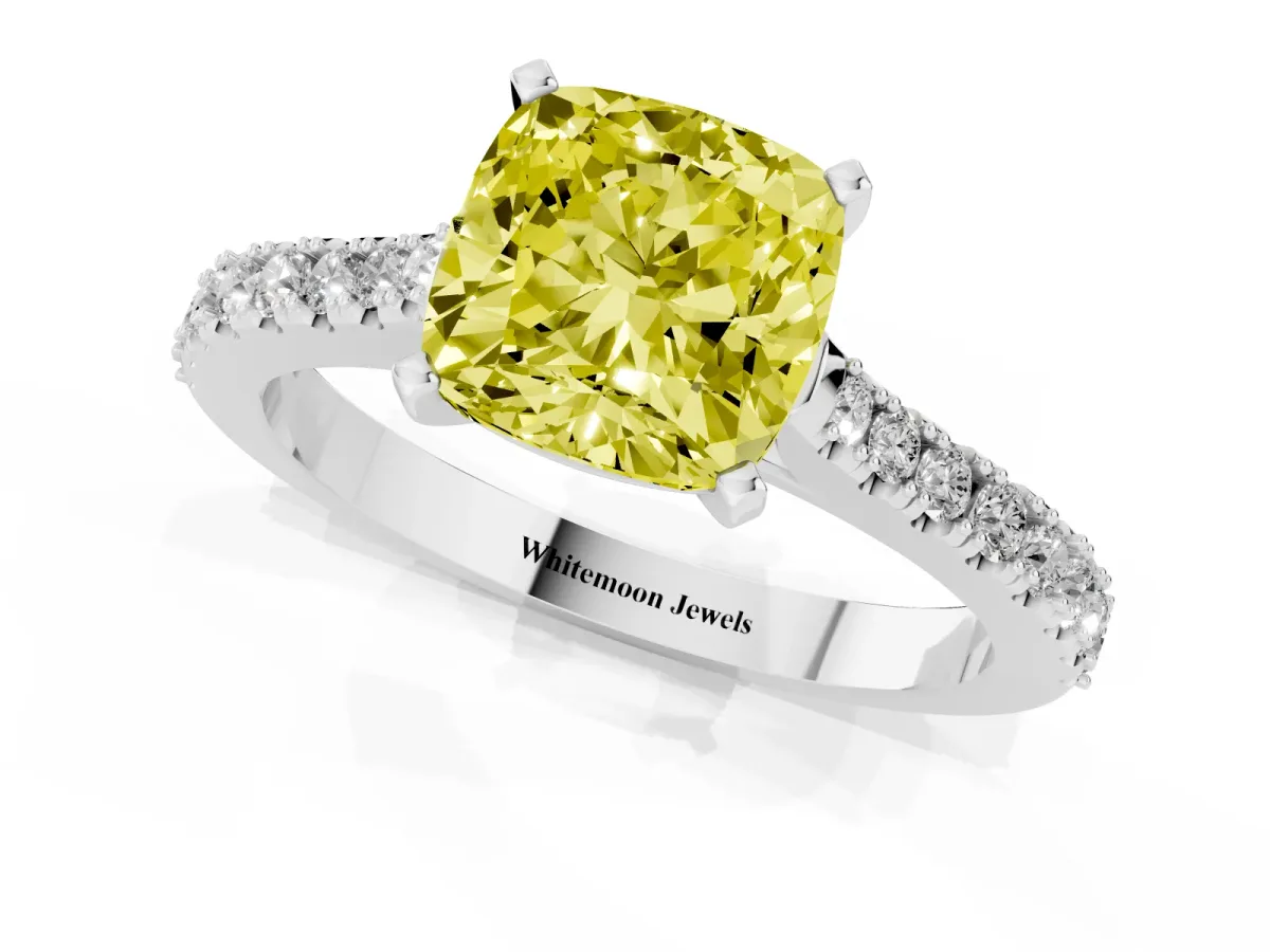 Fancy Yellow Cushion Cut Cut Solitaire Diamond Engagement Ring with Pave Band and Four-Prong Setting Platinum