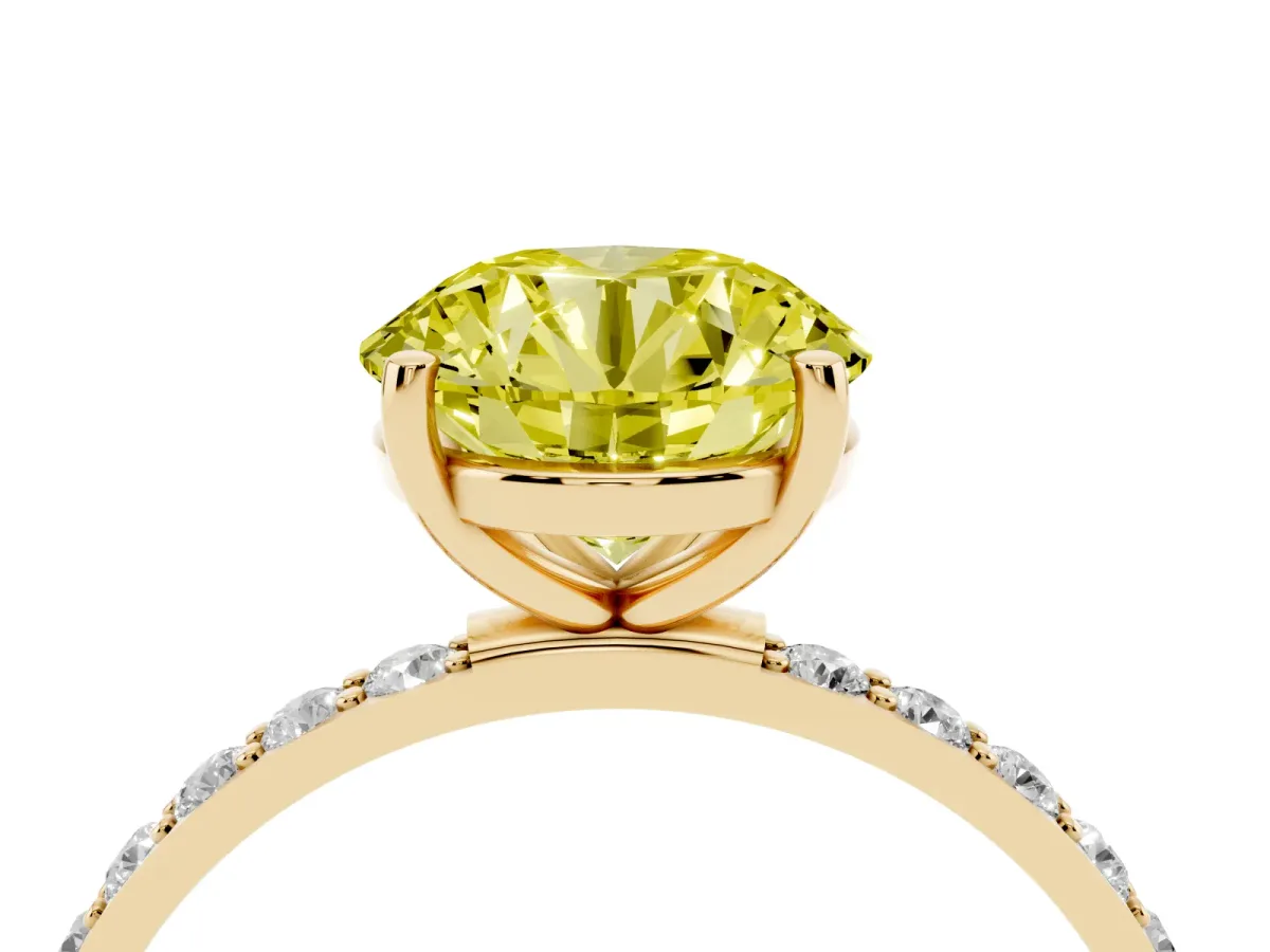 Fancy Yellow Round Cut Diamond Solitaire Ring with Round Pavé Shoulders and Prong Setting Yellow gold