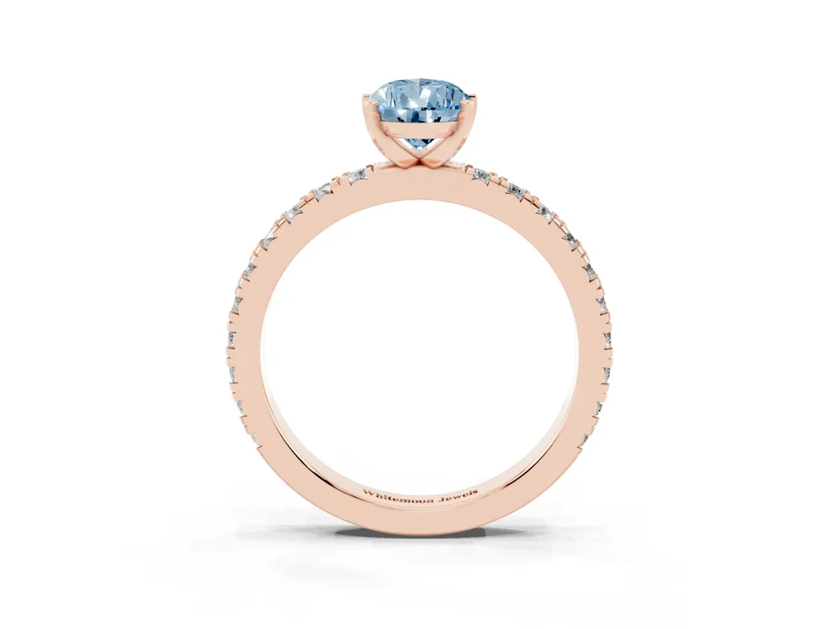 Fancy Blue Pear Cut Diamond Pavé Band Solitaire with Four-Prong Setting Rose gold