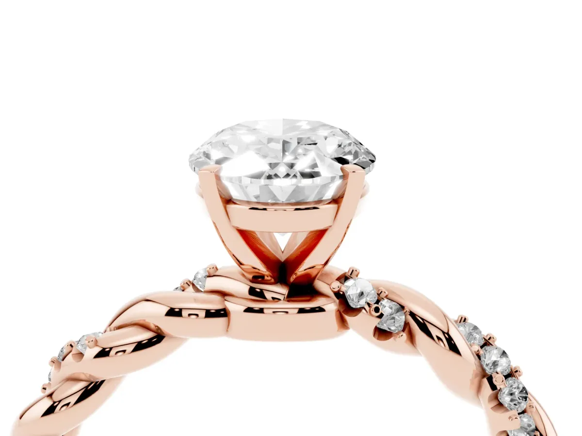 Oval Cut Diamond Solitaire Ring with Twisted Band and Pavé Accents Rose gold