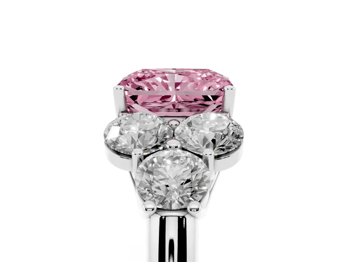 Fancy Pink Radiant Cut Cut Diamond Cluster Ring with Round Accent Stones and Prong Setting on a Classic Band White gold