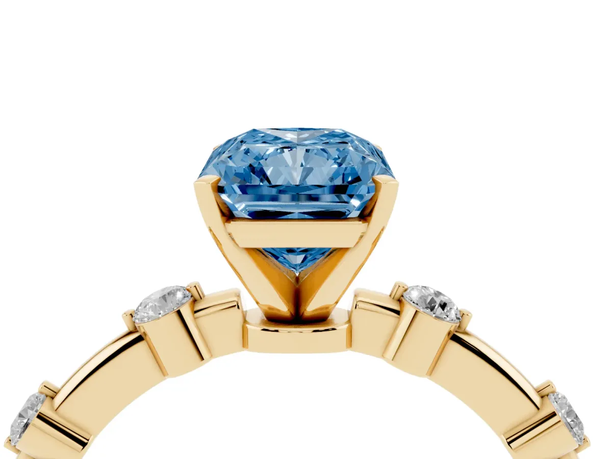 Fancy Blue Radiant Cut Solitaire Diamond Ring with Bezel Set Side Stones and Prong Setting Yellow gold