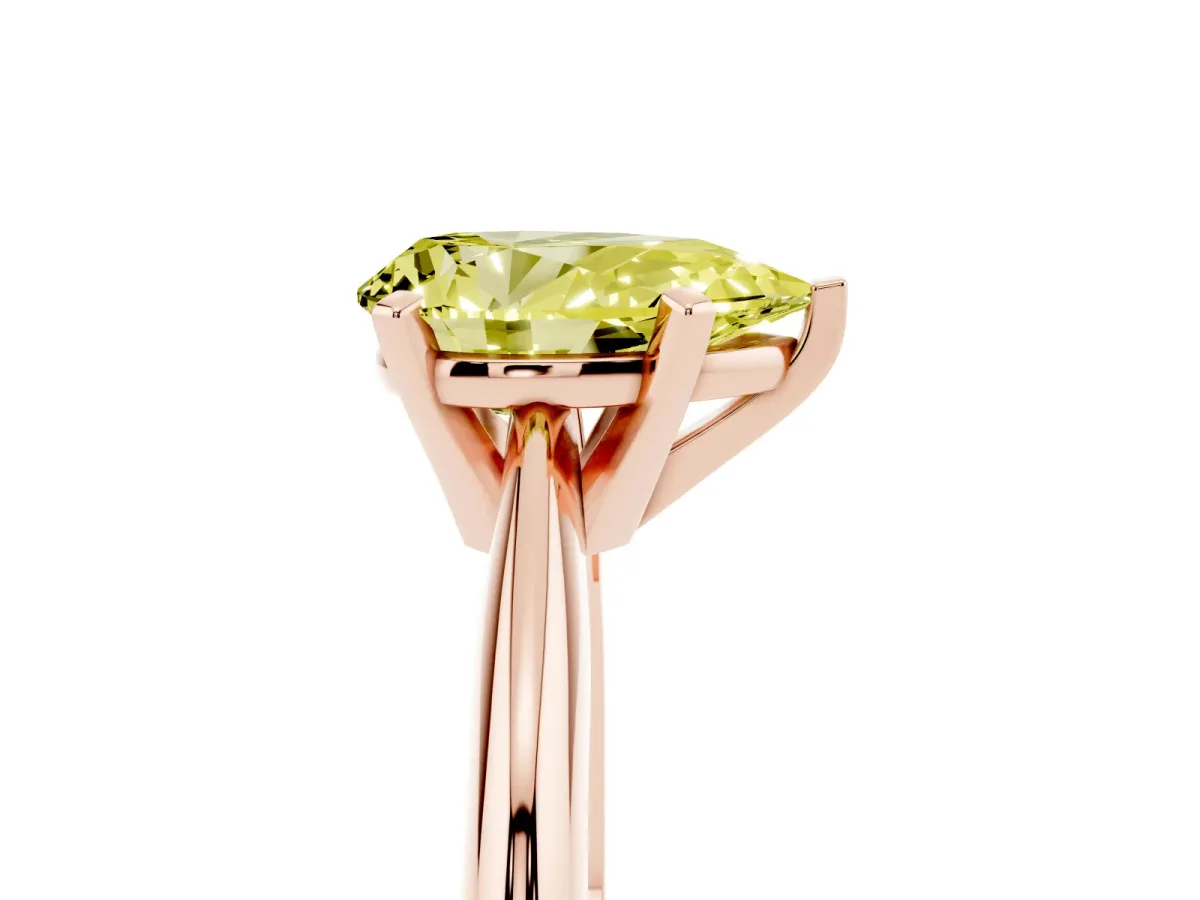 Fancy Yellow Pear Cut Cut Solitaire Ring with Four-Prong Setting on a Classic Band Rose gold