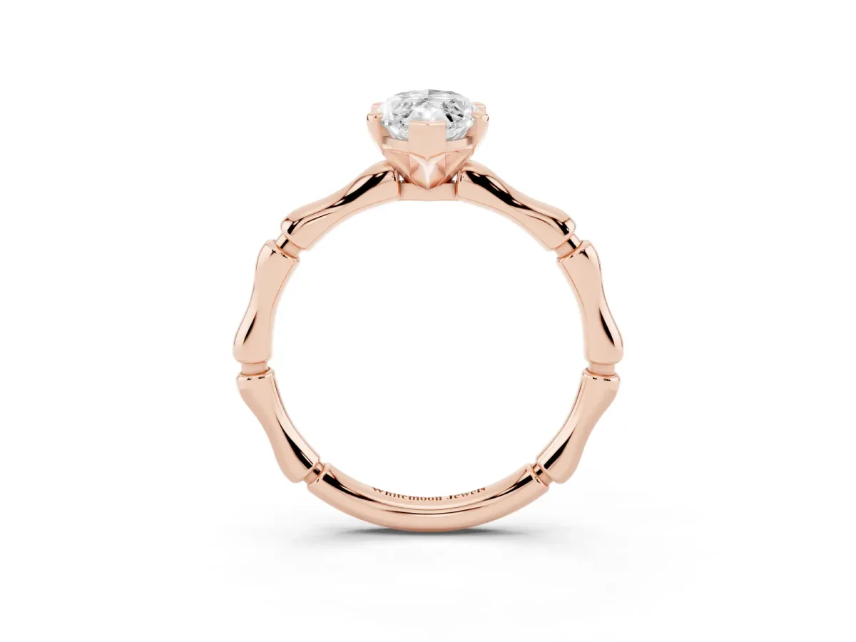 Marquise Cut Solitaire Diamond Ring with Bamboo Band and Four-Prong Setting Rose gold