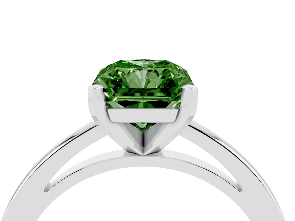 Fancy Green Radiant Cut Solitaire Diamond Engagement Ring with Four-Prong Setting on a Classic Band Silver