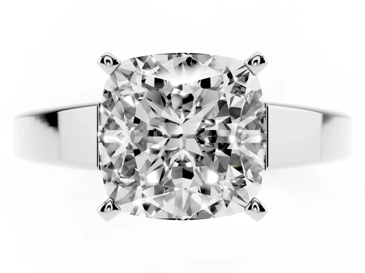 Cushion Cut Solitaire Engagement Ring with Four-Prong Setting and Tapered Band Platinum