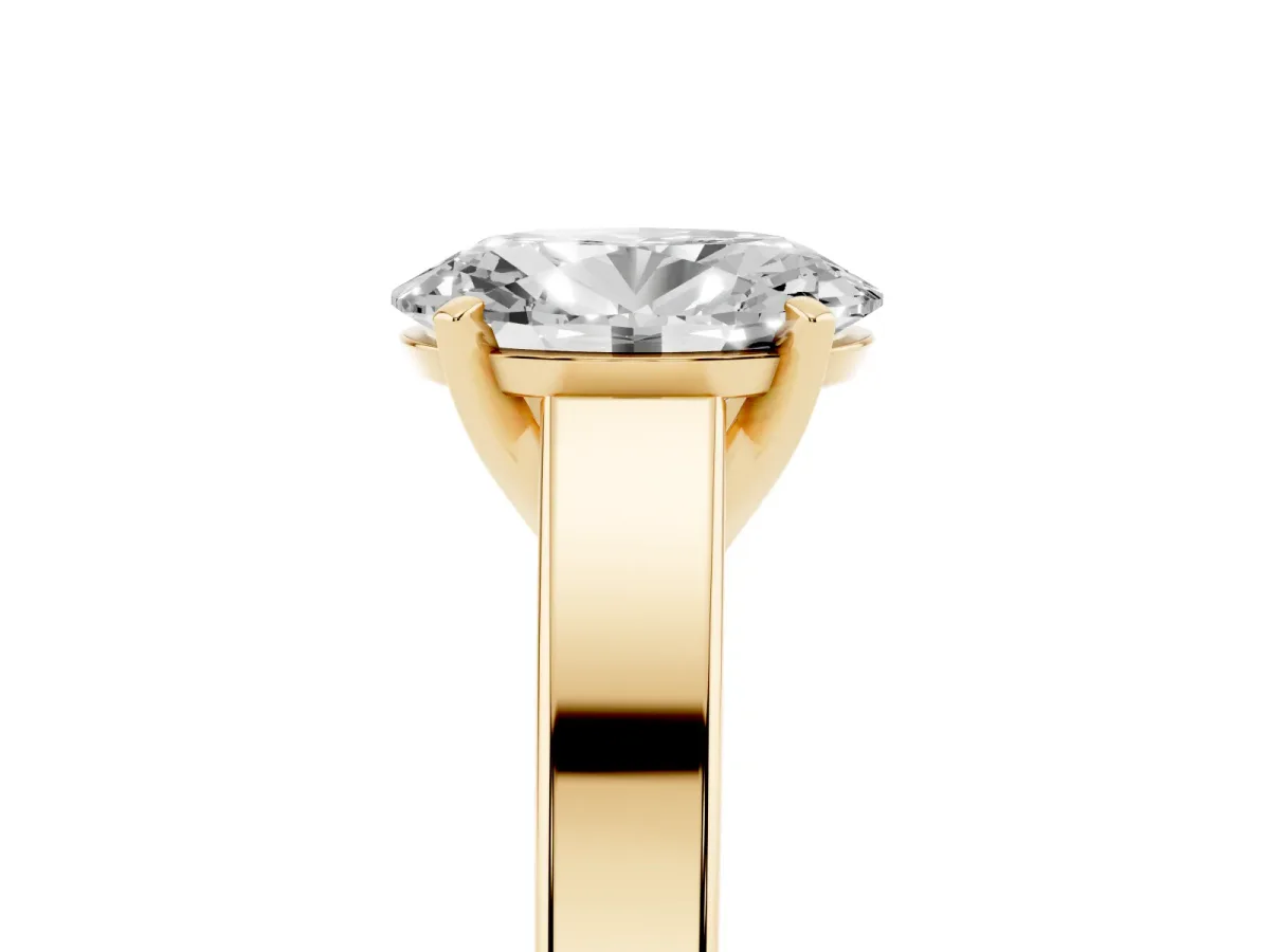 Oval Cut Solitaire Engagement Ring with Four-Prong Setting and Tapered Band Yellow gold