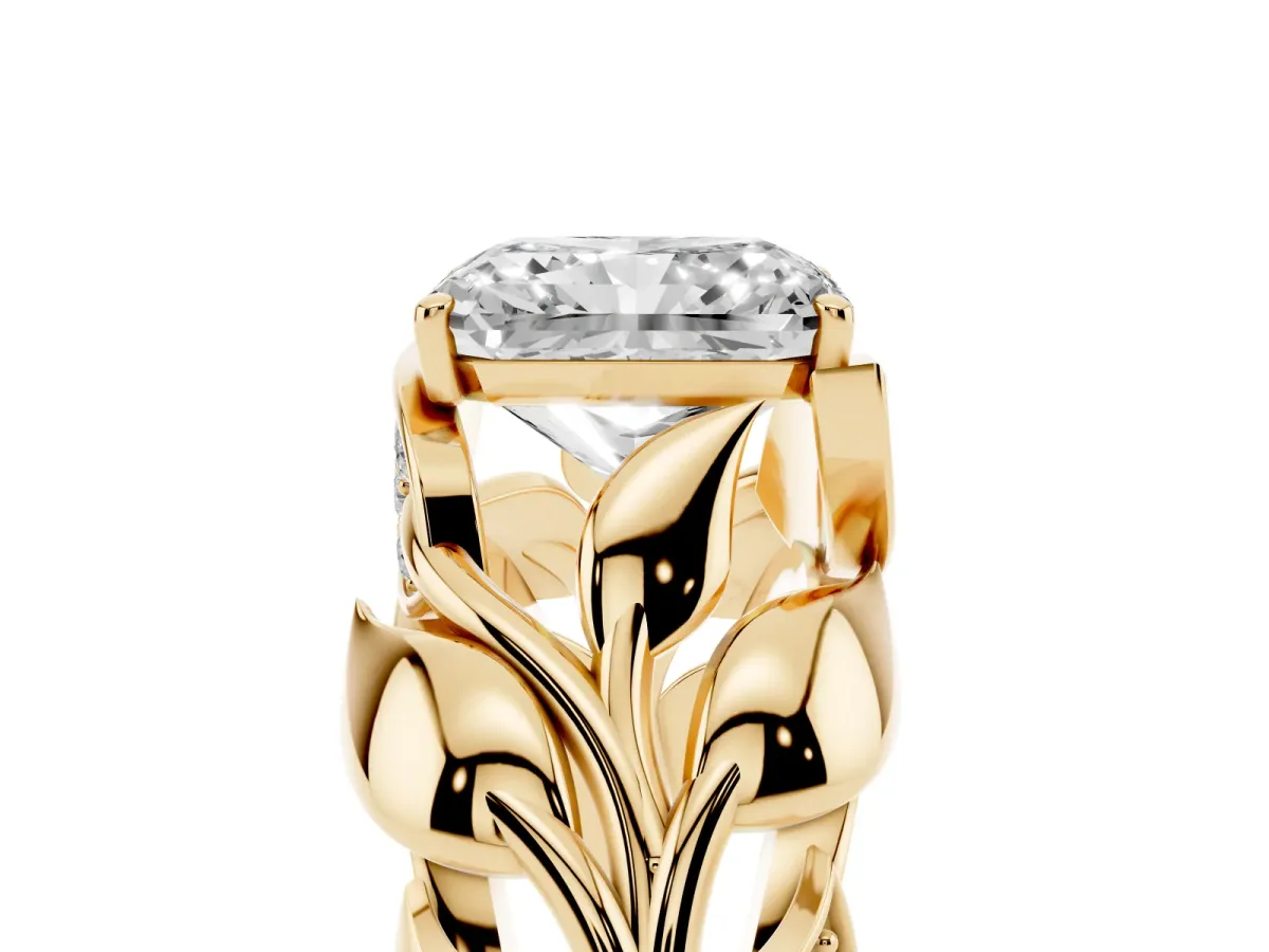 Radiant Cut Diamond Leaf-Inspired Engagement Ring with Round Accents and Prong Setting Yellow gold