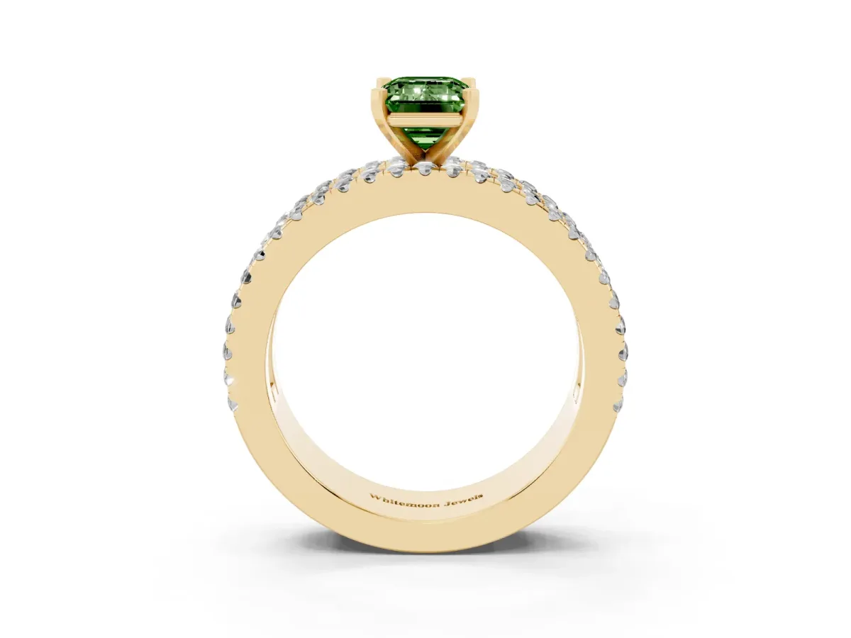 Fancy Green Emerald Cut Diamond Solitaire Ring with Pavé and Channel Set Band Yellow gold