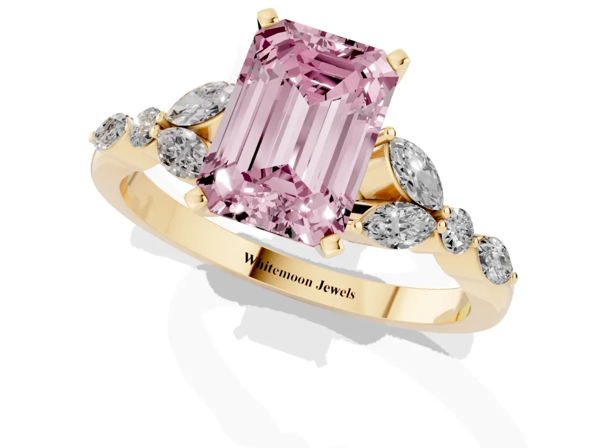 Fancy Pink Emerald Cut Diamond Solitaire Ring with Side Stones and Four-Prong Setting Yellow gold