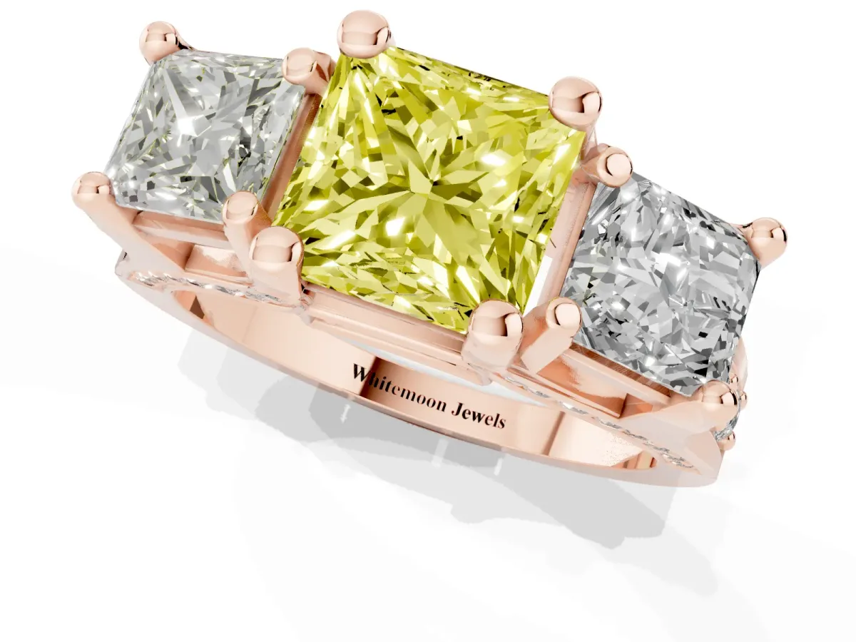 Fancy Yellow Princess Cut Diamond Three-Stone Ring with Channel Set Band and Four-Prong Setting Rose gold