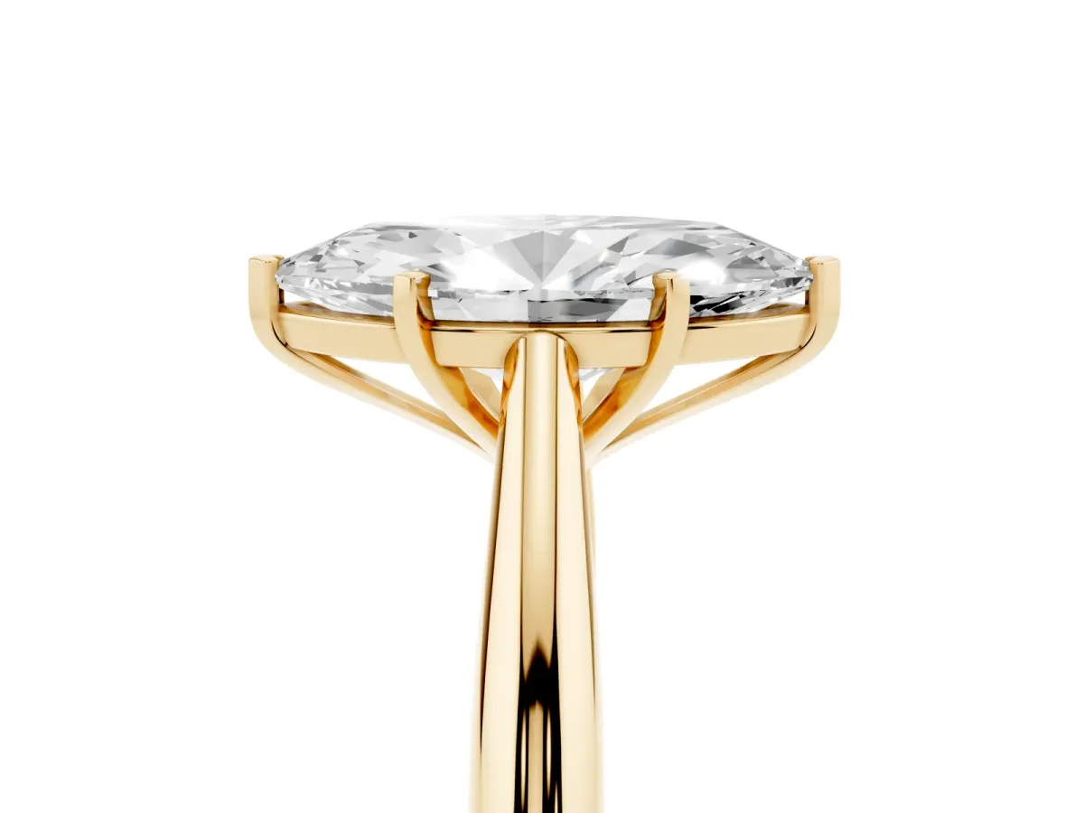 Marquise Cut Diamond Solitaire Engagement Ring with Cathedral Setting and Four-Prong Mount Yellow gold