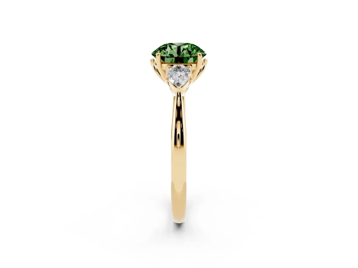 Fancy Green Three-Stone Round Cut Diamond Ring with Pear Side Stones in Four-Prong Setting Yellow gold