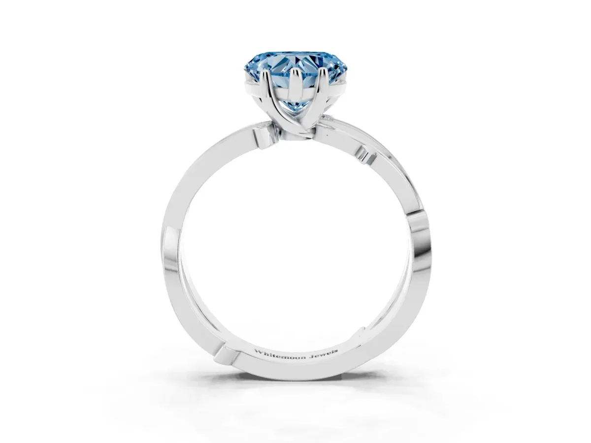 Fancy Blue Heart Cut Solitaire Twist Band with Pavé Accents and Four-Prong Setting Silver