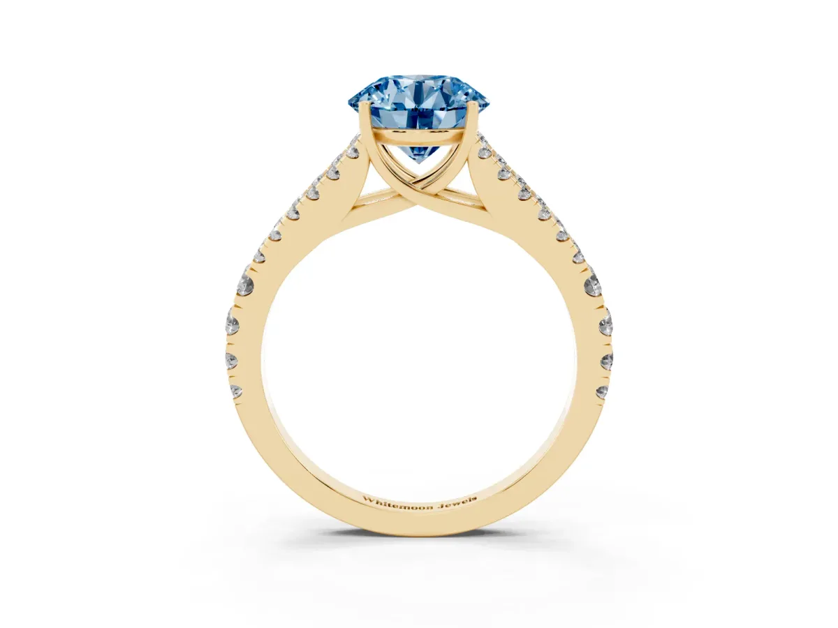 Fancy Blue Round Cut Diamond Split Shank Pavé Engagement Ring with Four-Prong Setting Yellow gold